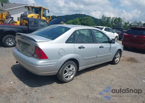 2001 Ford Focus Se z USA, uszkodzony, nr VIN 1FAFP34371W174955